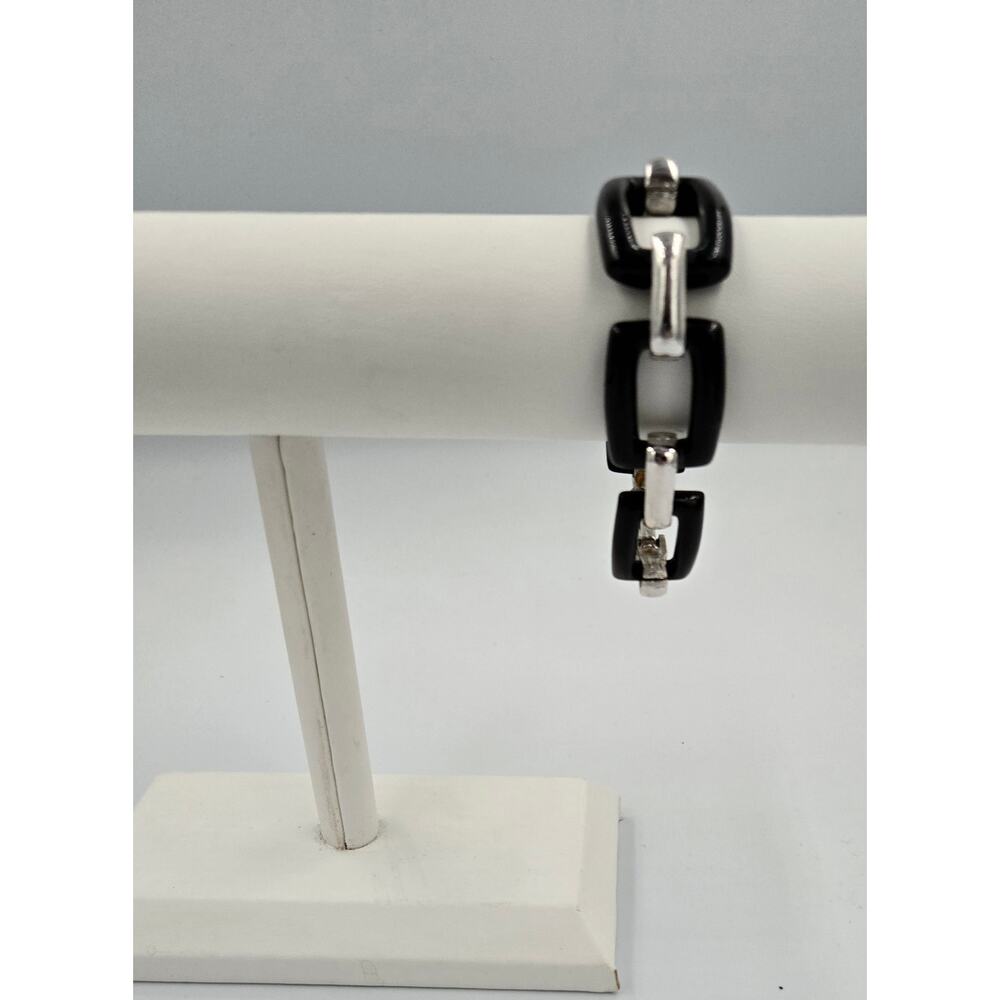 Black and Silver Colored Plastic Bracelet Lightweight and Versatile